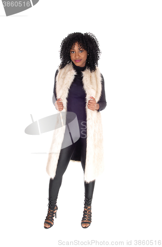 Image of African American woman in fur coat.