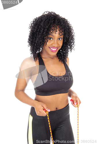 Image of African American woman with exercise rope.