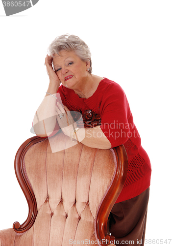 Image of Happy relaxed senior woman.