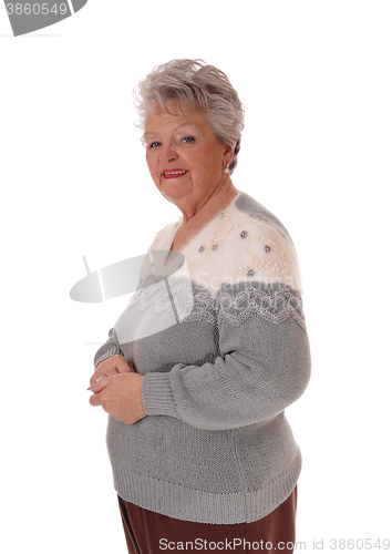 Image of Older senior woman standing.