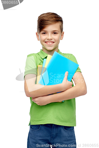 Image of happy student boy with folders and notebooks