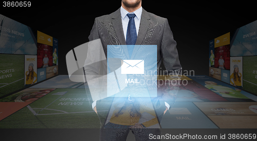 Image of close up of businessman in suit with email icon