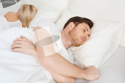 Image of young man suffering from insomnia