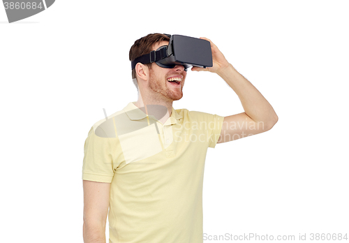 Image of happy man in virtual reality headset or 3d glasses