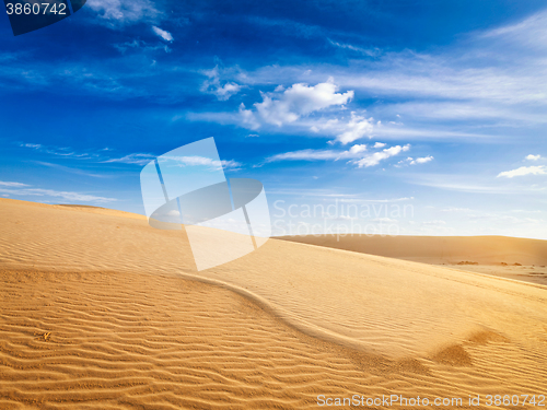 Image of Desert sand dunes on sunrise