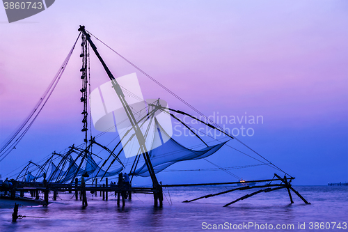 Image of Chinese fishnets on sunset. Kochi, Kerala, India