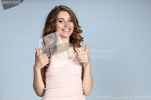 Image of The young woman\'s portrait with happy emotions