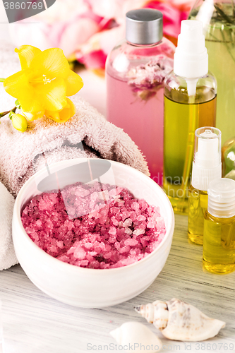 Image of Spa setting with pink roses and aroma oil, vintage style 