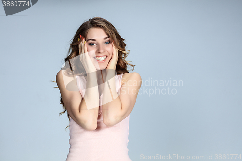 Image of The young woman\'s portrait with happy emotions