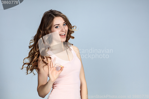 Image of The young woman\'s portrait with happy emotions