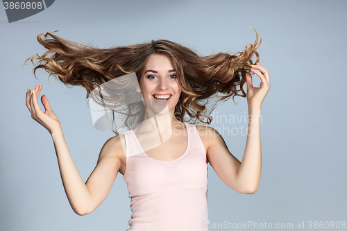 Image of The young woman\'s portrait with happy emotions