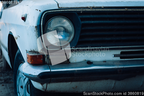 Image of old abandoned white car