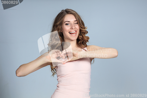 Image of The young woman\'s portrait with happy emotions