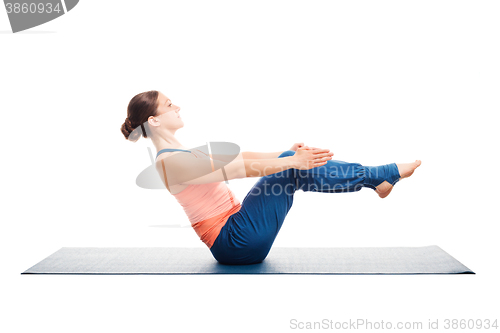 Image of Sporty fit woman doing Ashtanga Vinyasa yoga asana Paripurna nav