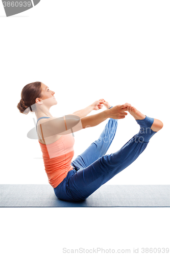 Image of Woman doing Ashtanga Vinyasa yoga asana Upavistha konasana