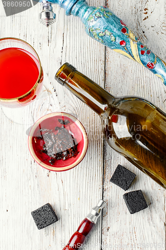 Image of Hookah and wine