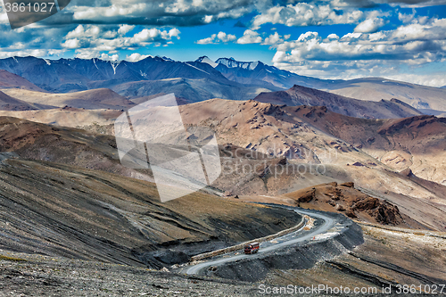 Image of Indian lorry truck on road in Himalayas mountains