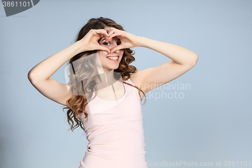 Image of The young woman\'s portrait with happy emotions