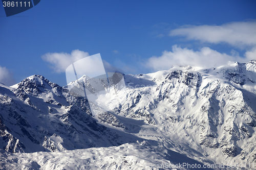 Image of Snowy mountains and glacier at sunny day