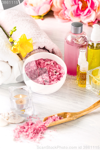 Image of Spa setting with pink roses and aroma oil, vintage style 