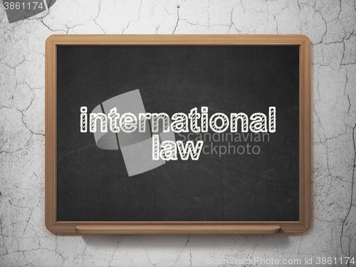 Image of Politics concept: International Law on chalkboard background