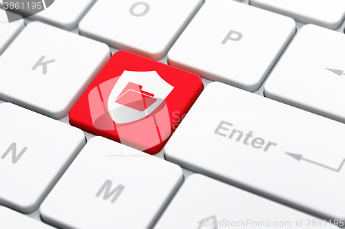 Image of Finance concept: Folder With Shield on computer keyboard background