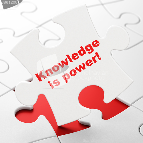 Image of Learning concept: Knowledge Is power! on puzzle background