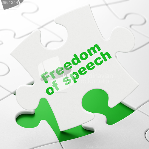 Image of Politics concept: Freedom Of Speech on puzzle background