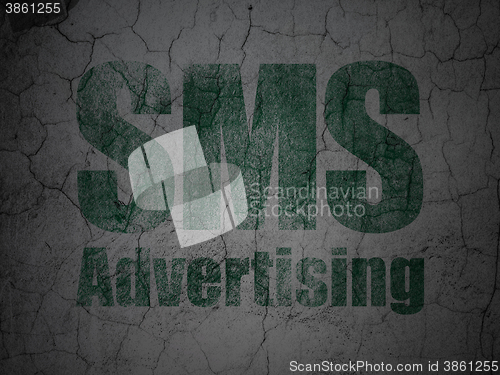 Image of Advertising concept: SMS Advertising on grunge wall background