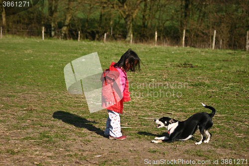 Image of Child and dog