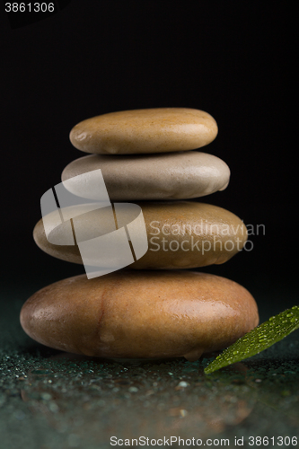Image of balancing zen stones on black