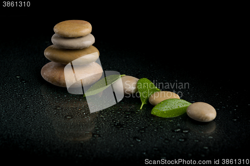 Image of balancing zen stones on black