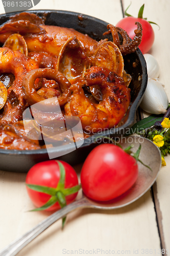 Image of fresh seafoos stew on an iron skillet