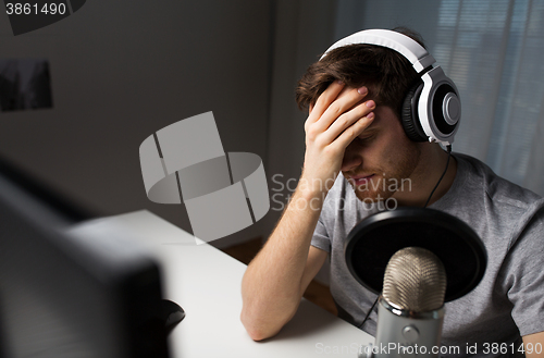 Image of close up of man losing computer video game