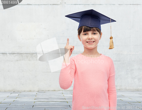 Image of happy girl in bachelor hat or mortarboard