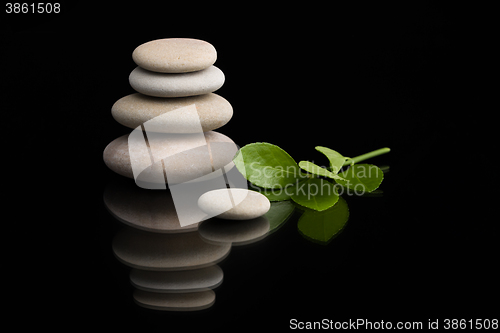 Image of balancing zen stones on black
