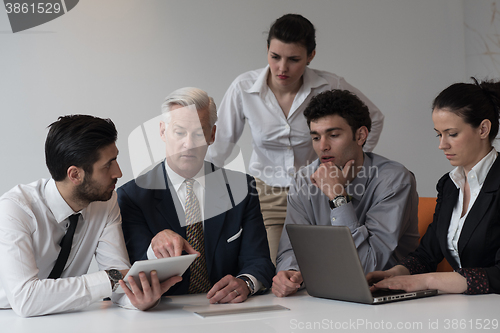 Image of business people group on meeting at modern startup office