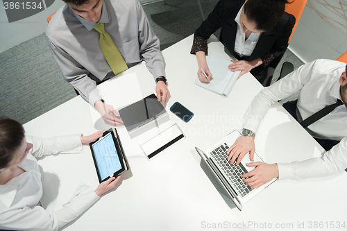 Image of aerial view of business people group brainstorming on meeting