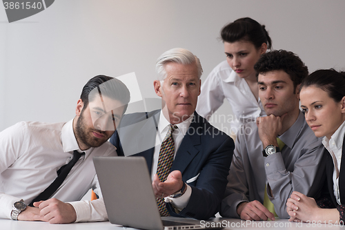 Image of business people group on meeting at modern startup office
