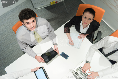 Image of aerial view of business people group brainstorming on meeting