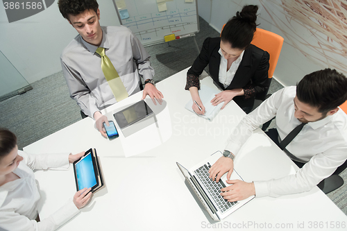 Image of aerial view of business people group brainstorming on meeting