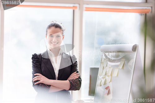 Image of portrait of young business woman at modern office