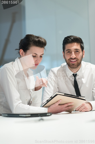 Image of portrait of young  business couple at office