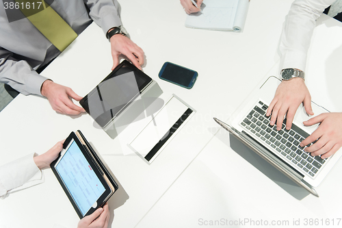 Image of aerial view of business people group brainstorming on meeting