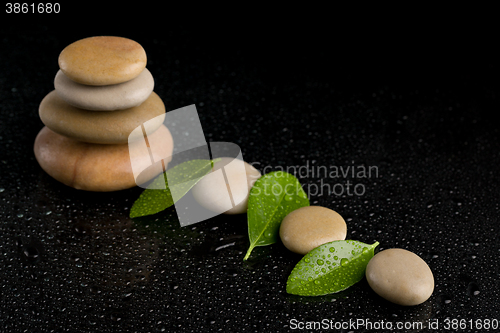 Image of balancing zen stones on black