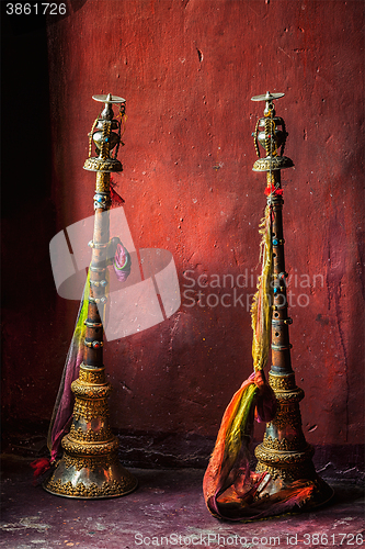 Image of Buddhist prayer horns in Tibetan monastery