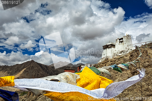 Image of Leh gompa and lungta prayer flags, Ladakh