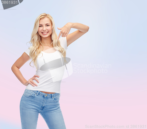 Image of happy young woman or teenage girl in white t-shirt