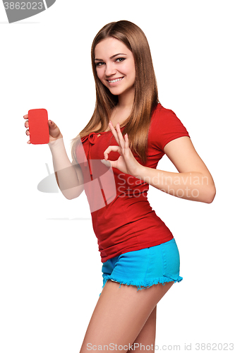 Image of smiling teen girl holding blank credit card