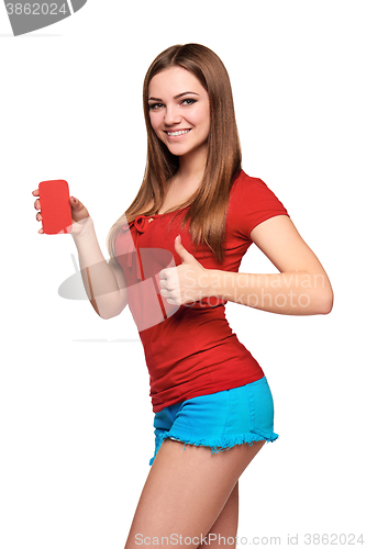 Image of smiling teen girl holding blank credit card